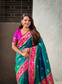 Teal Green & Rani Pink Premium Luxury Silk Saree with Elephant Zari Motifs & Grand Lotus Border
