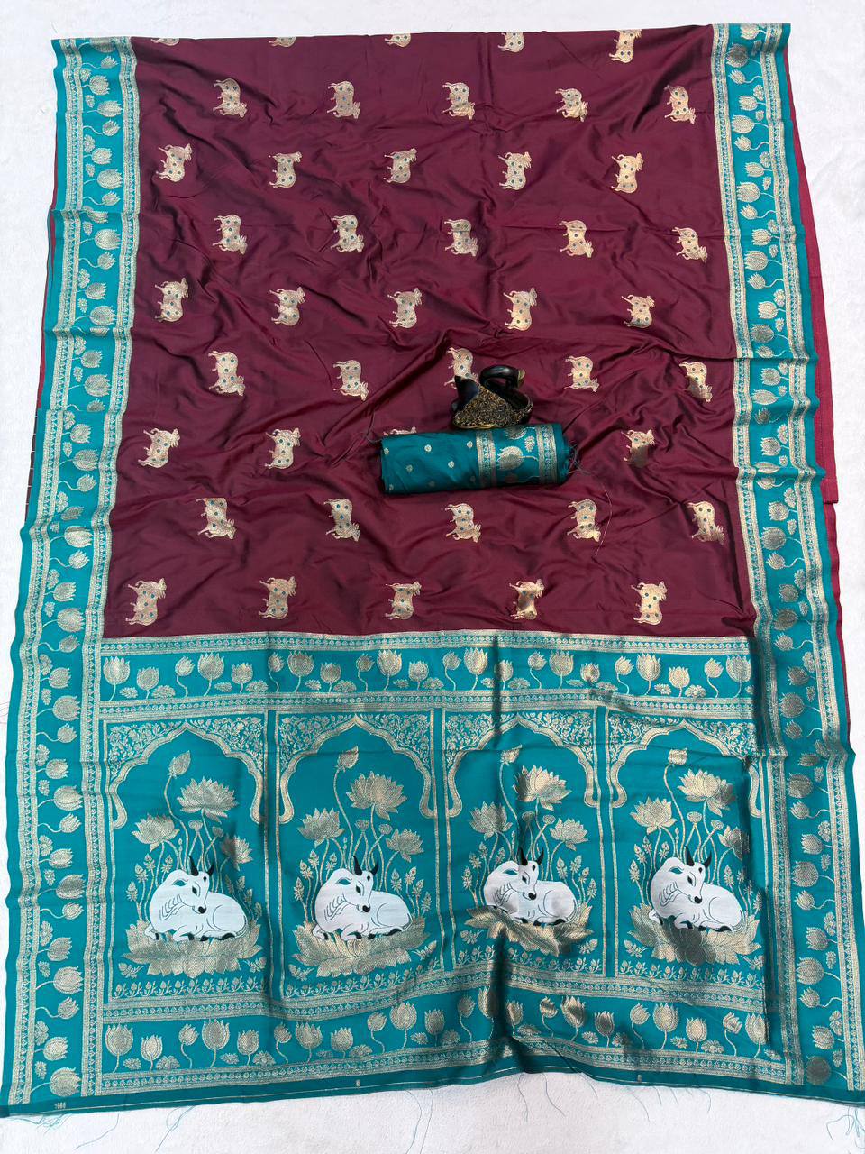 Chocolate Brown & Peacock Teal Premium Luxury Silk Saree with Elephant Zari Motifs & Grand Lotus Border