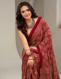 Regal Vermilion Mal Mal Silk Saree with Intricate Heritage Zari Motifs