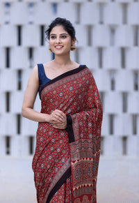 Heritage Rust Ajrakh Inspired Silk Saree with Geometric Royal Motifs