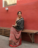 Luxury Black Linen Saree with Ajrakh-Inspired Red Prints & Classic Stripe Pallu