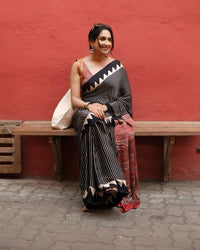 Luxury Black Linen Saree with Ajrakh-Inspired Red Prints & Classic Stripe Pallu