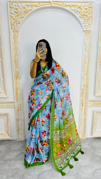 Luxury Sky Blue Linen Saree with Vibrant Floral Prints & Fresh Green Border