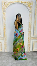 Luxury Sky Blue Linen Saree with Vibrant Floral Prints & Fresh Green Border