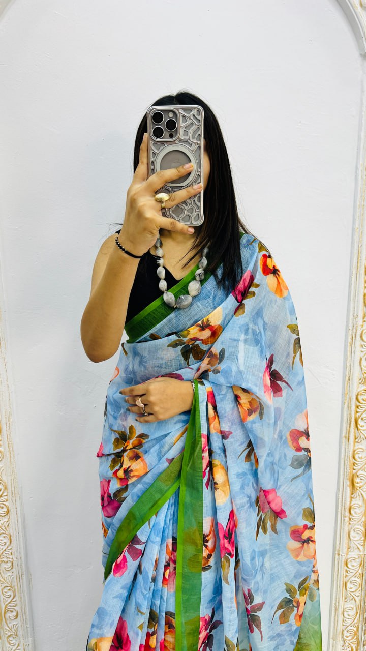 Luxury Sky Blue Linen Saree with Vibrant Floral Prints & Fresh Green Border