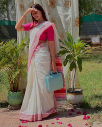 Luxury Ivory Linen Saree with Vibrant Multicolor Temple Border & Elegant Minimal Buttas