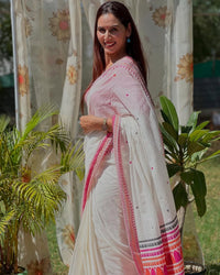 Luxury Ivory Linen Saree with Vibrant Multicolor Temple Border & Elegant Minimal Buttas