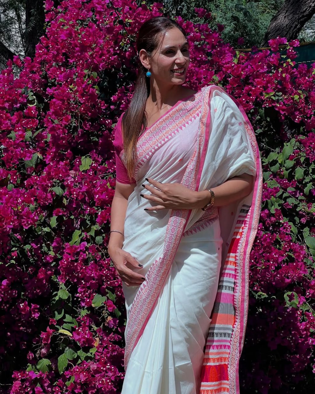 Luxury Ivory Linen Saree with Vibrant Multicolor Temple Border & Elegant Minimal Buttas