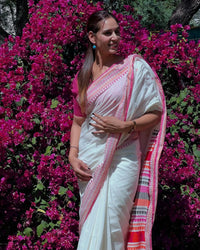 Luxury Ivory Linen Saree with Vibrant Multicolor Temple Border & Elegant Minimal Buttas