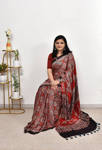 Luxury Vermilion Red Linen Saree with Bold Geometric Prints & Heritage Ajrakh-Inspired Border