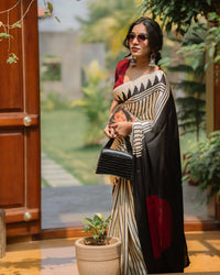 Classic Ivory & Black Striped Designer Saree with Bold Artistic Border
