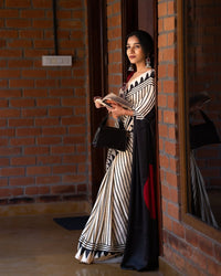 Classic Ivory & Black Striped Designer Saree with Bold Artistic Border