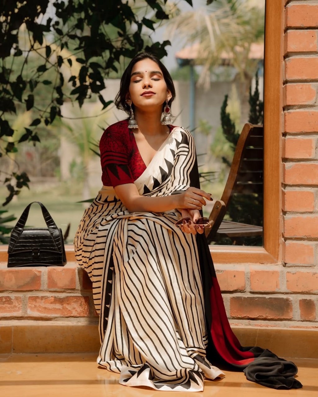 Classic Ivory & Black Striped Designer Saree with Bold Artistic Border