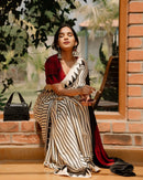 Classic Ivory & Black Striped Designer Saree with Bold Artistic Border