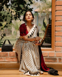 Classic Ivory & Black Striped Designer Saree with Bold Artistic Border