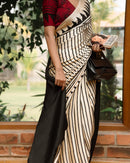 Classic Ivory & Black Striped Designer Saree with Bold Artistic Border