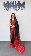 Elegant Bottle Green Designer Saree with Vibrant Red Folk Art Pallu