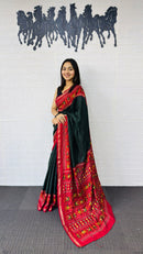 Elegant Bottle Green Designer Saree with Vibrant Red Folk Art Pallu