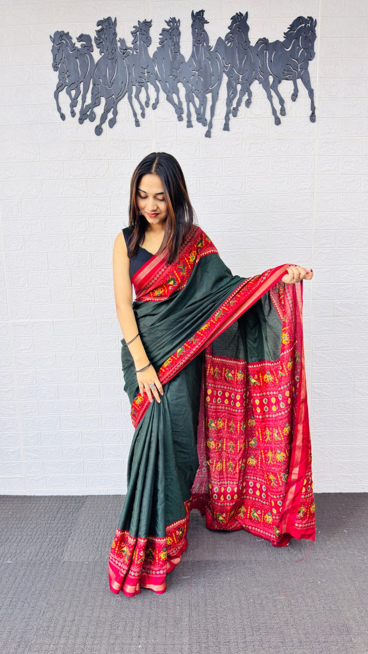Elegant Bottle Green Designer Saree with Vibrant Red Folk Art Pallu