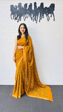 Radiant Mustard Yellow Designer Saree with Intricate Heritage Tribal Print