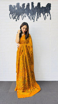 Radiant Mustard Yellow Designer Saree with Intricate Heritage Tribal Print