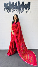 Vibrant Rani Pink Designer Saree with Intricate Heritage Tribal Print