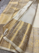 Royal Off-White Banarasi Silk Saree with Grand Gold Zari Elephant Border | Premium Wedding & Festive Wear