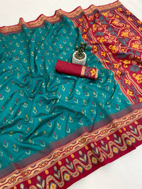 Deep Teal Traditional Ikkat Style Silk Saree with Multicolor Floral Border & Statement Pallu | Premium Festive Wear