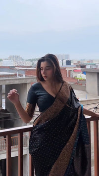 Elegant Black Georgette Saree with Antique Gold Floral Border & Butti Work