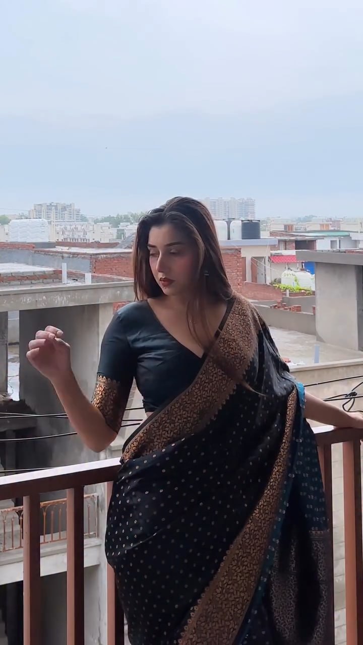 Elegant Black Georgette Saree with Antique Gold Floral Border & Butti Work