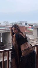 Elegant Black Georgette Saree with Antique Gold Floral Border & Butti Work