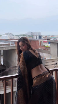 Elegant Black Georgette Saree with Antique Gold Floral Border & Butti Work
