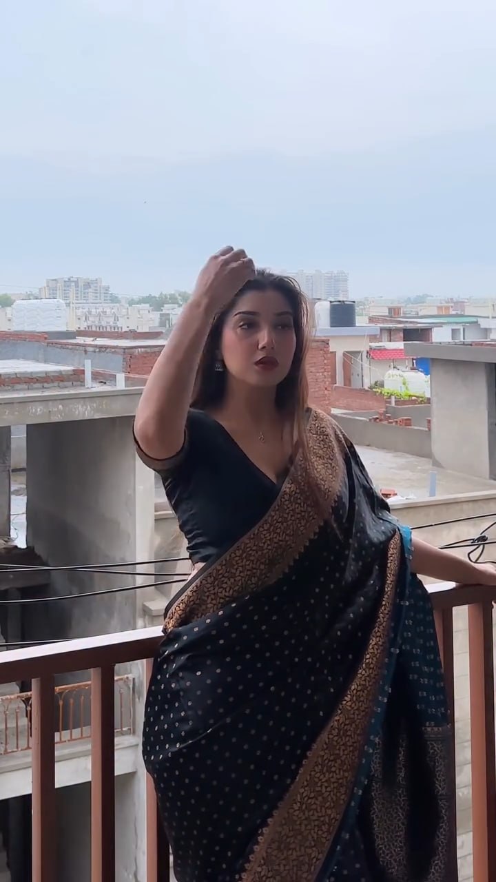 Elegant Black Georgette Saree with Antique Gold Floral Border & Butti Work