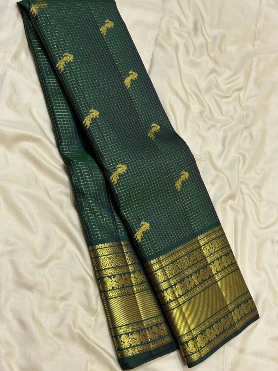 Premium Peacock Green Kanjivaram Silk Saree with Rich Gold Zari Border & Peacock Motifs