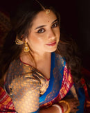 Royal Magenta Banarasi Silk Saree with Sky Blue Contrast Border & Rich Gold Zari Weaving
