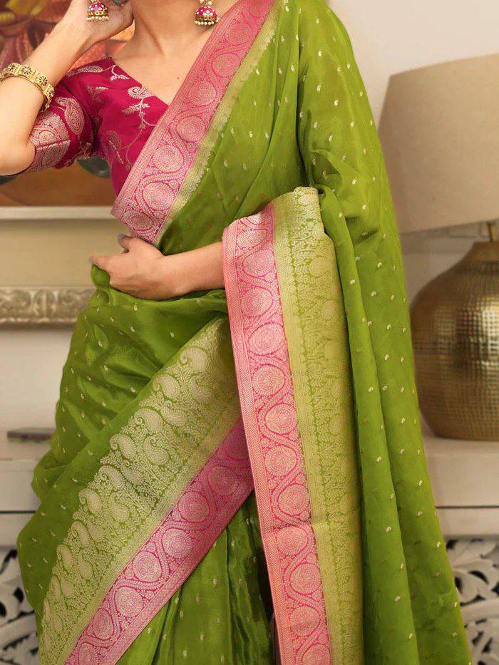 Elegant Olive Green Banarasi Silk Saree with Pink Contrast Border & Delicate Zari Weaving