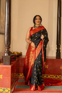 Elegant Black Banarasi Silk Saree with Red Contrast Border & Rich Gold Zari Weaving