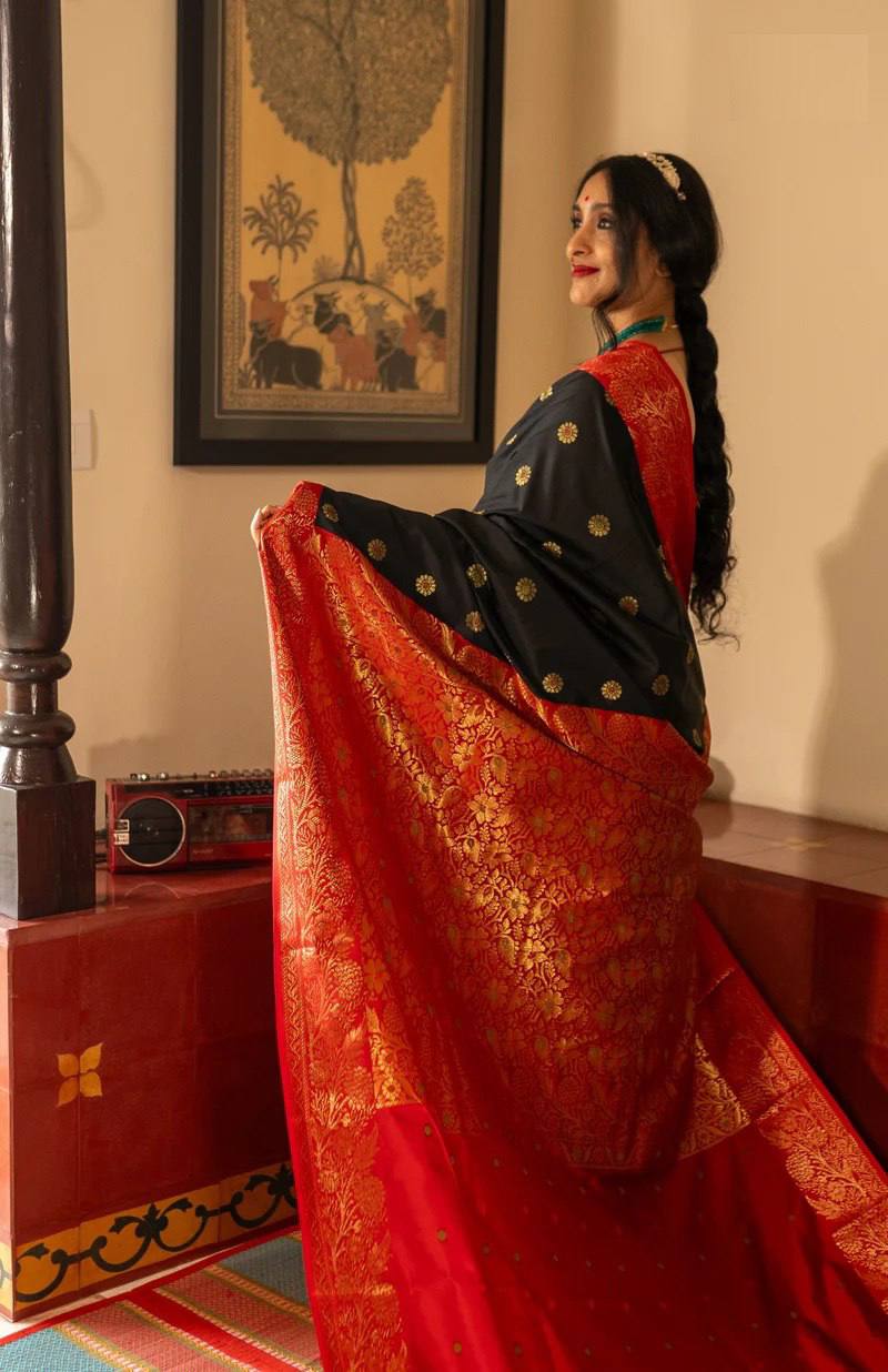 Elegant Black Banarasi Silk Saree with Red Contrast Border & Rich Gold Zari Weaving