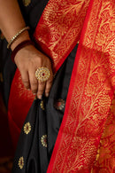 Elegant Black Banarasi Silk Saree with Red Contrast Border & Rich Gold Zari Weaving