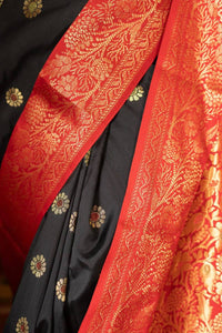 Elegant Black Banarasi Silk Saree with Red Contrast Border & Rich Gold Zari Weaving