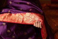Royal Purple Banarasi Silk Saree with Red Contrast Border & Rich Gold Zari Floral Weaving