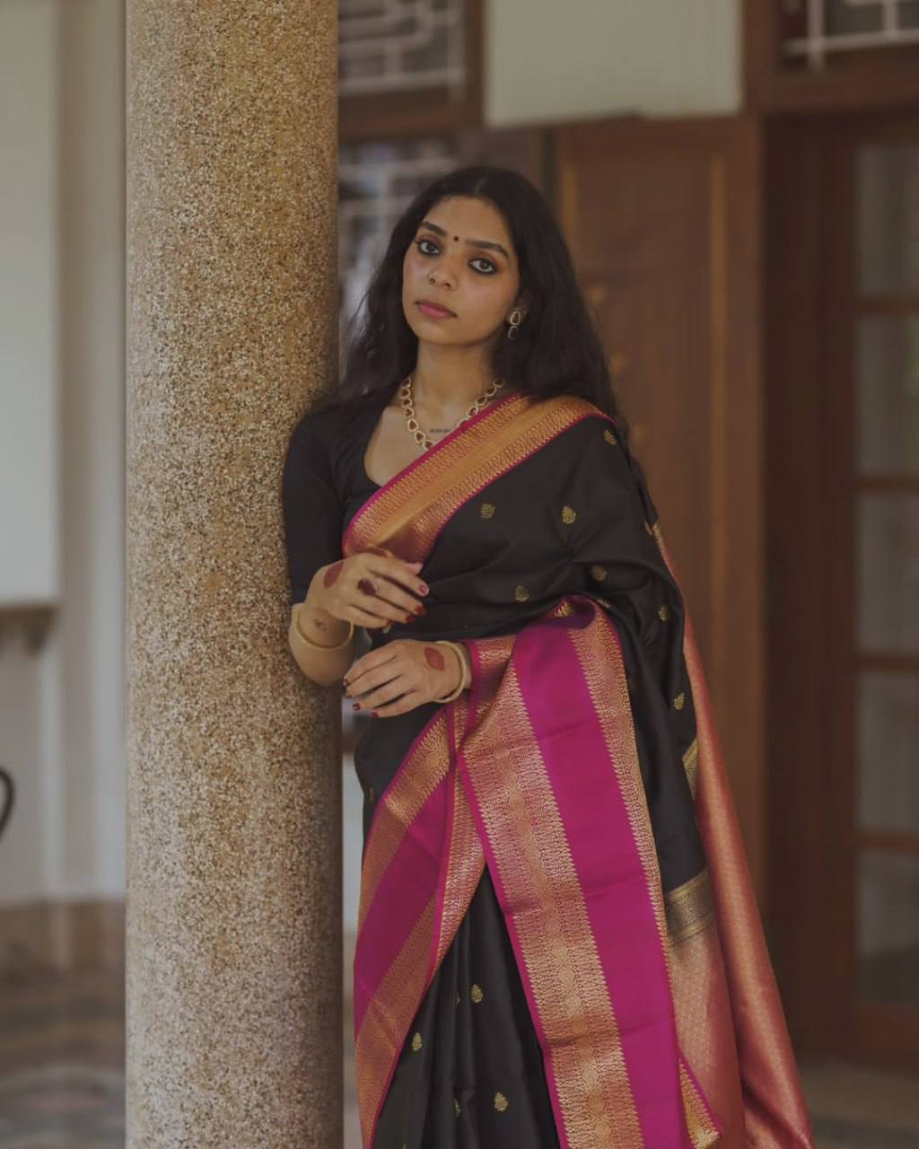 Elegant Black Banarasi Silk Saree with Rani Pink Contrast Border & Gold Zari Weaving