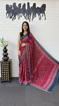 Rani Pink Cotton Saree with Traditional Tribal Print & Teal Blue Border