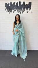 Powder Blue Linen Silk Saree with Floral Embroidered Border