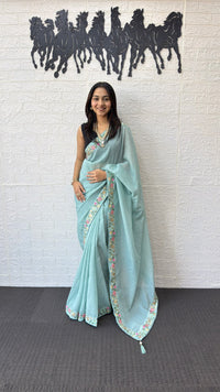 Powder Blue Linen Silk Saree with Floral Embroidered Border