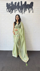 Pastel Pistachio Green Linen Silk Saree with Floral Embroidered Border