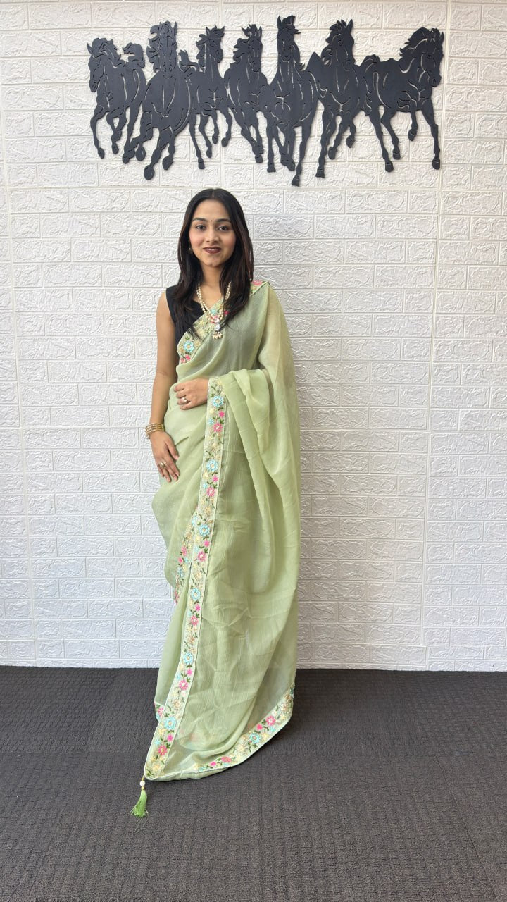 Pastel Pistachio Green Linen Silk Saree with Floral Embroidered Border