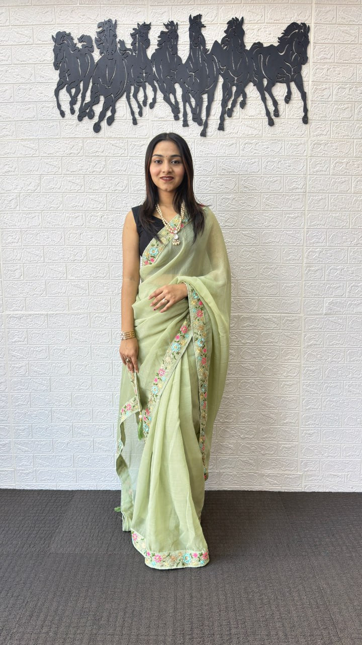 Pastel Pistachio Green Linen Silk Saree with Floral Embroidered Border