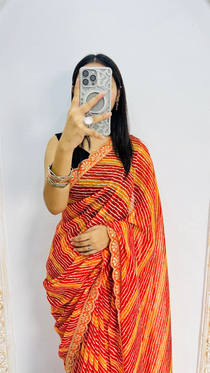 Fiery Orange Leheriya Print Saree with Elegant Embroidered Lace Border