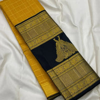 Mustard Yellow Silk Saree with Navy Blue Peacock Zari Pallu
